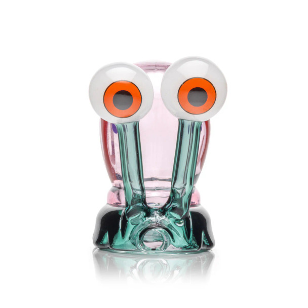 Front view of Hemper snail glass hand pipe with large white eyes and orange pupils