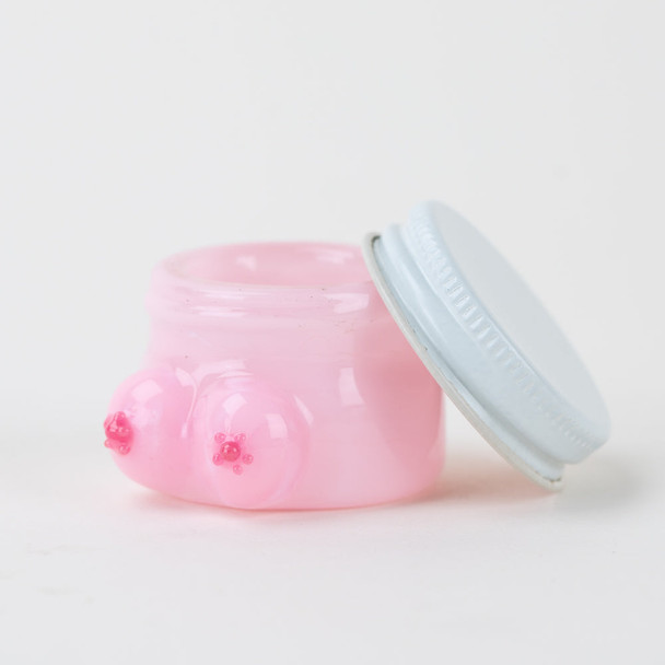 Open pink Boobies glass terp jar for wholesale dab accessories, showing fitted lid and interior