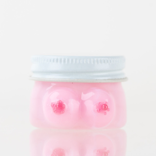 Pink 1.5" Empire Glassworks Boobies terp jar for wholesale smoke shop displays with silver lid
