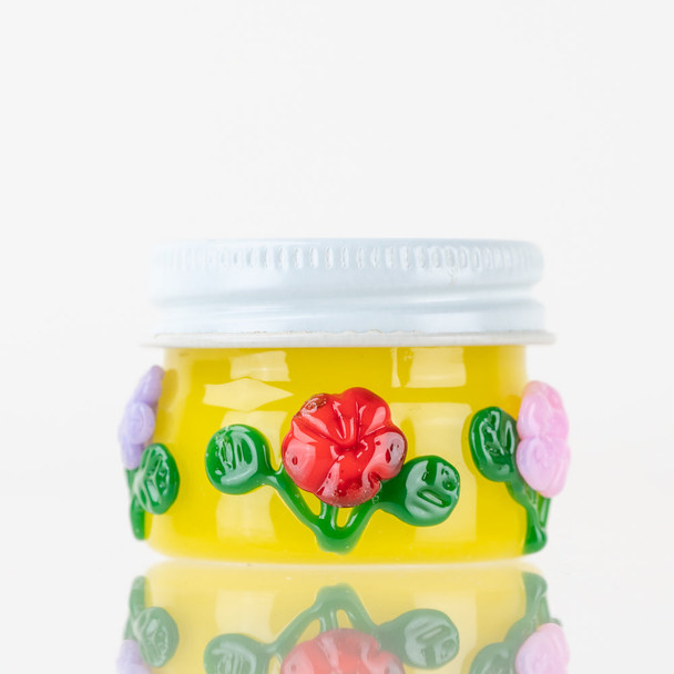 Yellow 1.5" Empire Glassworks Sunshine Garden terp jar for wholesale smoke shop displays with flowers