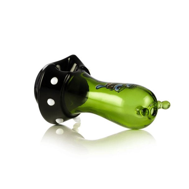 Green alien-themed glass hand pipe angled to show black base, white dots, and bowl opening