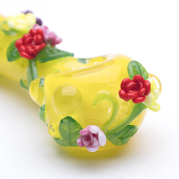 Empire Glassworks Sunshine Garden hand pipe displayed to highlight sculpted floral lampwork details