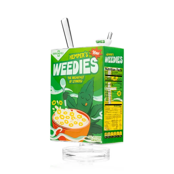Angled view of Weedies cereal box XL bong with front artwork, white bowl, and nutrition side panel