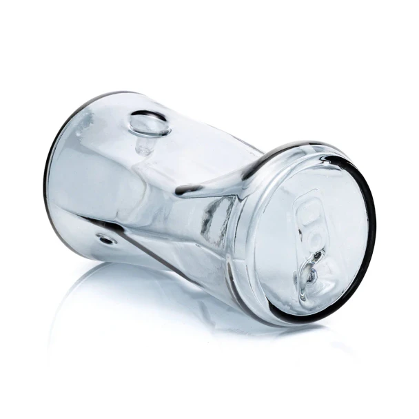 Crushed can glass hand pipe lying on its side with pull-tab base and top bowl opening