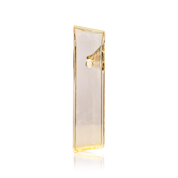 Narrow side view of gold brick glass hand pipe with raised bowl and slim rectangular profile