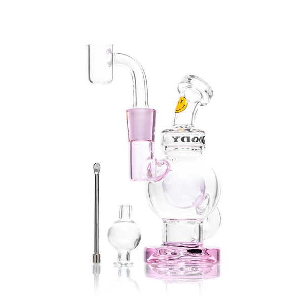 Pink-accent Goody Glass Orbit mini dab rig kit with quartz banger, bubble carb cap, and mini dab tool arranged beside rig