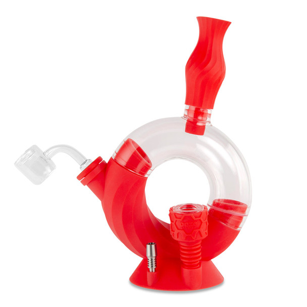 Ooze Ozone 4-in-1 hybrid silicone and glass water pipe with red silicone body, quartz banger attachment, removable bowl insert, and titanium tip accessory displayed on base stand.