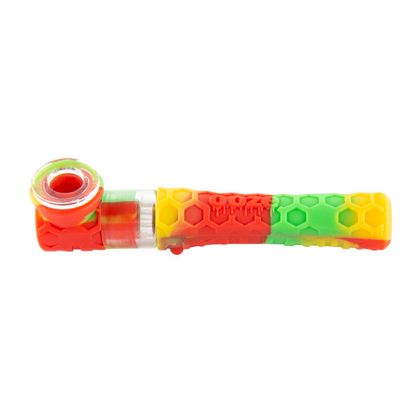Rasta color Ooze Piper silicone and glass hand pipe with red, yellow, and green hex-pattern body