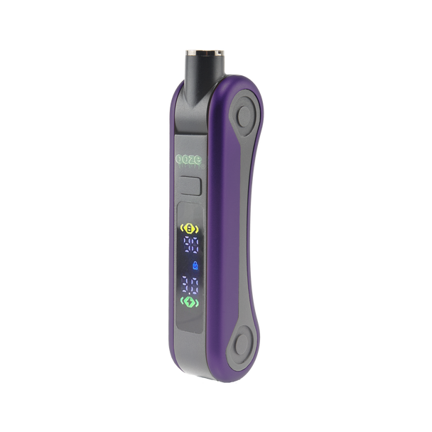 Angled front view of purple Ooze Hinge Flick 510-thread battery showing digital voltage display and concealed cartridge housing