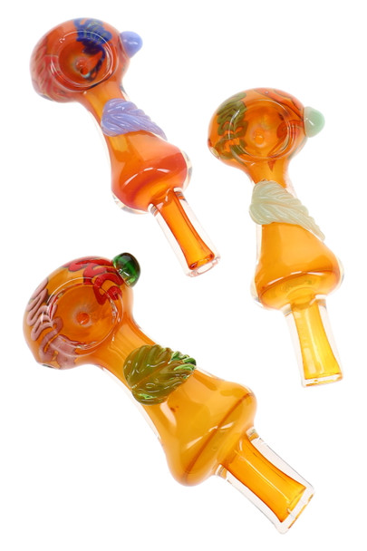 Assorted 5" gold fumed glass spoon pipes with colorful leaf accents and multicolor swirl bowl designs displayed in three color combinations