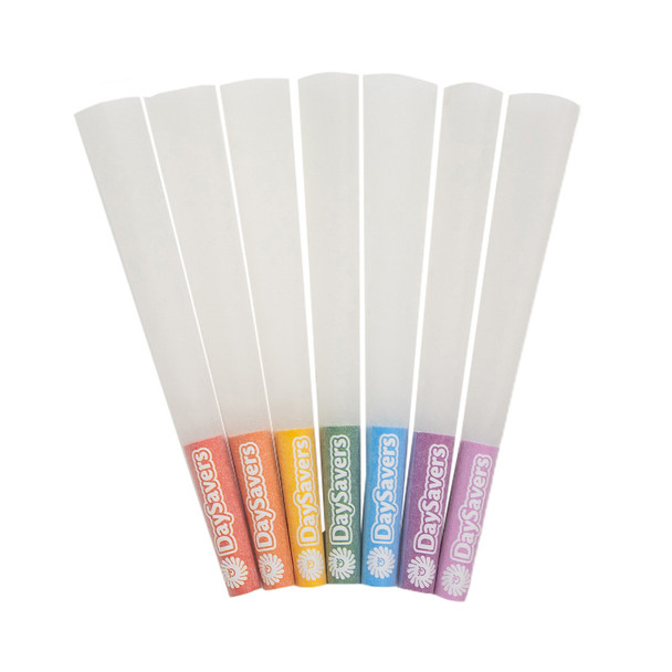 Seven DaySavers refined white pre-rolled cones fanned out with red, orange, yellow, green, blue, purple, and pink tips