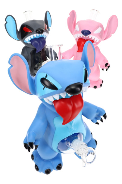 Blue, black, and pink creepy creature water pipes with clear glass chambers and expressive plastic exteriors