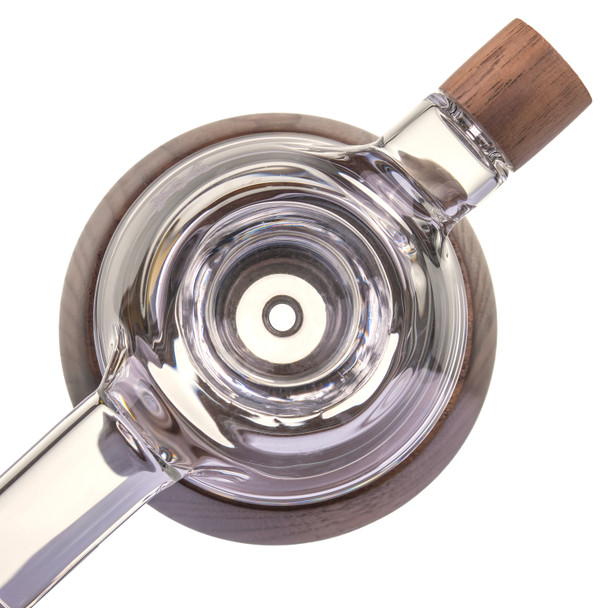 Overhead close-up of the 18 mm bowl set above the rounded black walnut base