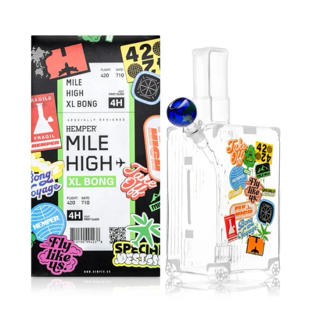 Hemper Mile High Suitcase XL glass bong displayed beside its branded retail packaging on white
