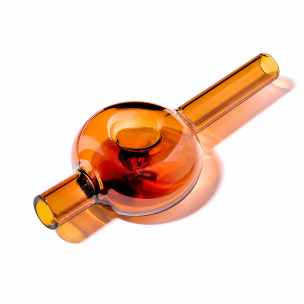 Baltic Amber NWTN Bolla glass hand pipe with a translucent amber finish and sculptural rounded bowl.