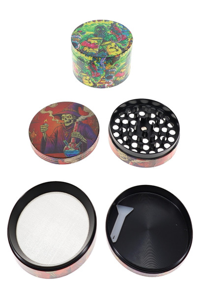 Colorful decal grinder shown assembled and opened to display black teeth, screen, collection chamber, and scraper