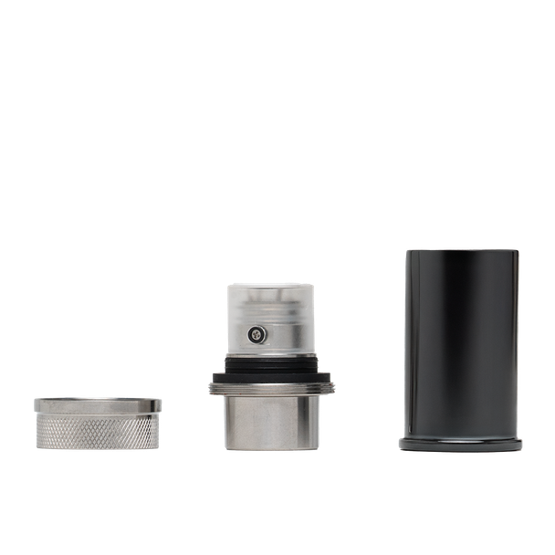 DaVinci EQ atomizer components disassembled with metal retention ring, connector, and black cylindrical cover