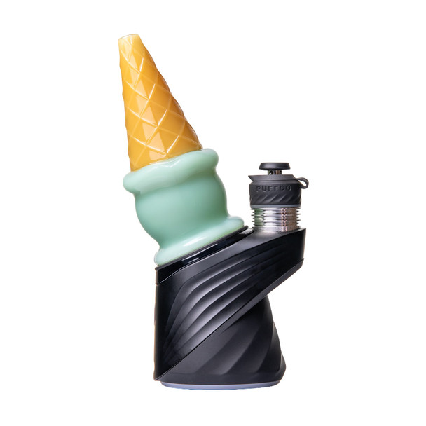 Side view of mint-green ice cream cone Peak top installed on black Puffco device with golden cone detail