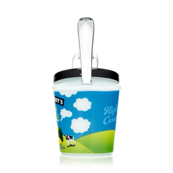 Rear angle of Hemper ice cream pint bong with upright clear mouthpiece, black rim, and blue cloud graphics