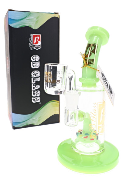 Green-accented 6B Glass donut perc dab rig with bent neck, sprinkle-style perc, clear bucket, hang tag, and retail box