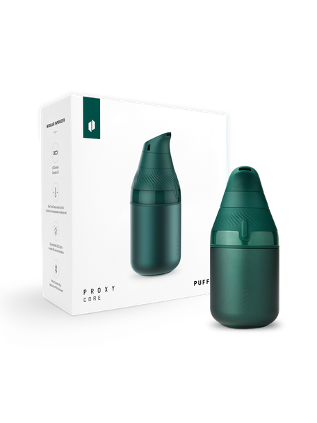 Limited-edition Pine Puffco Proxy Core displayed beside white retail box with product graphics and feature icons