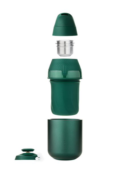 Exploded view of Pine Puffco Proxy Core Kit showing mouthpiece, chamber, device sections, cap, and three terp pearls