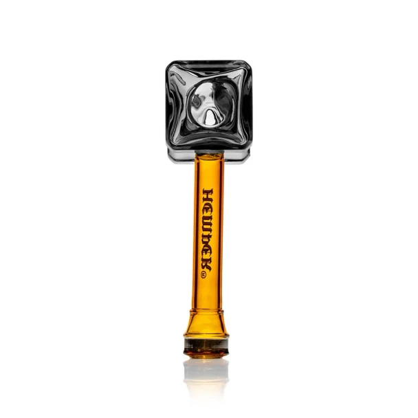 End-on view of Hemper Medieval Warhammer hand pipe with square black glass head and amber branded handle