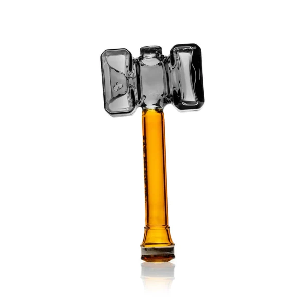 Hemper Medieval Warhammer glass hand pipe shown sideways with amber handle and transparent black hammer head