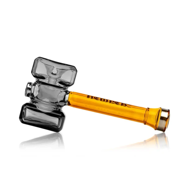Front view of Hemper Warhammer hand pipe with long amber glass handle and transparent black hammer-shaped head
