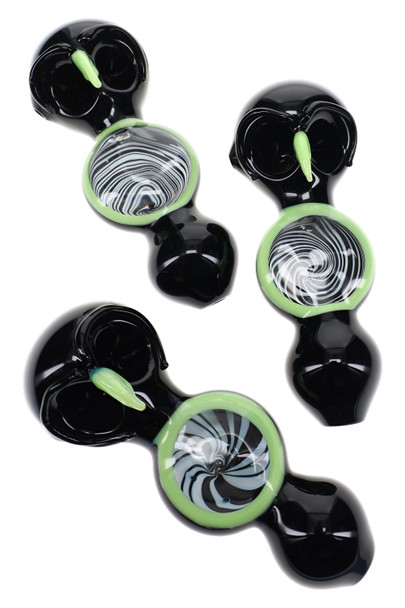 Three black glass owl pipes with neon green accents, double bowls, and varied black-and-white spiral center designs