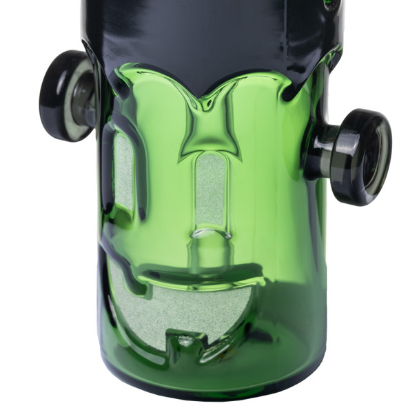 Close-up of MJ Arsenal Frankenbubbler monster face with textured glow-in-the-dark details and black side bolts