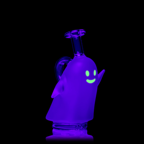 Three-quarter UV view of MJ Arsenal Specter Peak Top showing glowing green face, raised arms, and clear rear loop