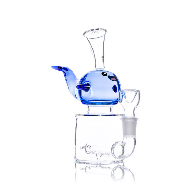 Angled view of HEMPER Blue Whale water pipe showing its raised tail, clear bowl, and cylindrical base.