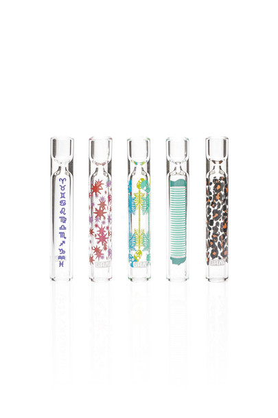 Five clear GRAV Patterns tasters with zodiac symbols, starbursts, skeletons, stripes, and leopard-print graphics.