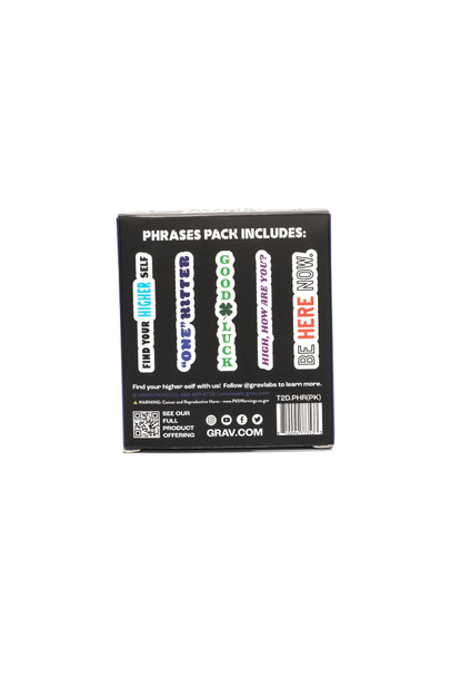 Back of the GRAV Phrases box with five illustrated lettering designs and a Phrases Pack Includes heading.