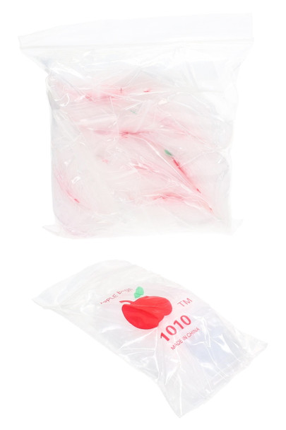 bulk wholesale Apple Bags clear mini baggie bundles with red apple logo on white studio backdrop