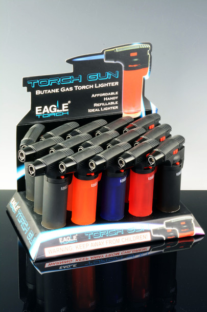 Countertop 15-piece Eagle Torch gun lighters, matte black with red, blue and orange tanks, front-left view for wholesale retail displays.