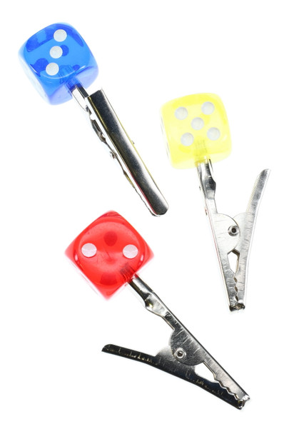 Wholesale metal roach clip trio with red, yellow and blue six-sided dice handles, serrated jaws shown on white backdrop