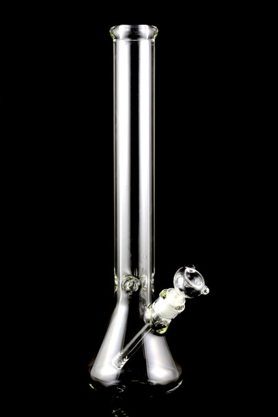 Angled view of large clear beaker water pipe with thick base and ice pinch; retail-ready glass