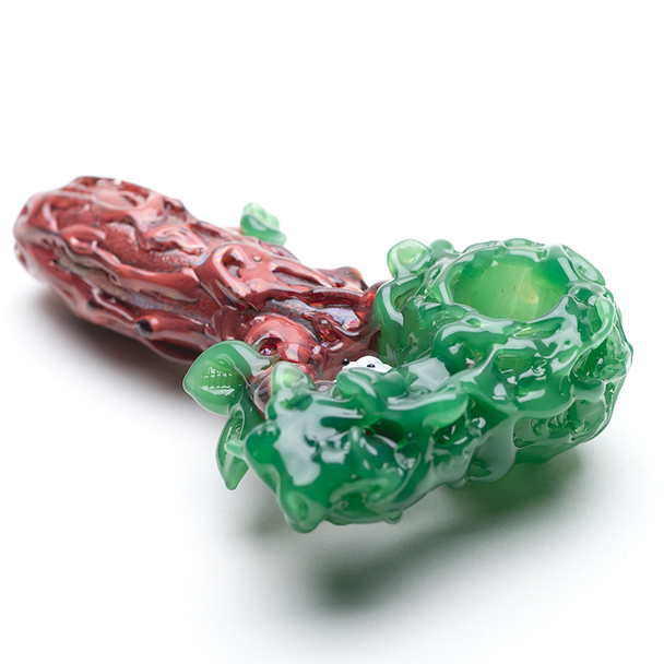 Close-crop of green canopy and squirrel perched in trunk hollow, glossy finish—retail smoke gear art-glass spoon for showcases.