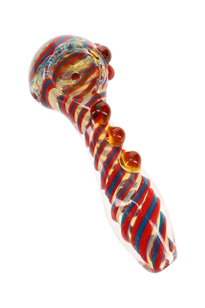 Close-up of a 4.5" color-changing frit glass spoon pipe featuring red and blue spiral stripe accents, amber raised marble grips, and a rounded spoon bowl.