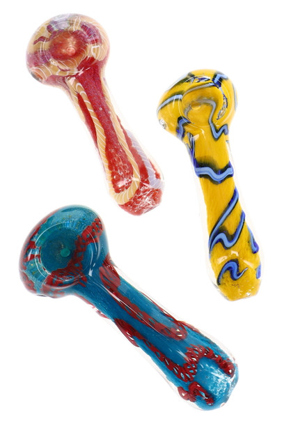 Assorted colorful glass spoon hand pipes featuring red, yellow, and blue swirl patterns displayed in multiple color variations.