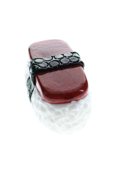 Top-down white-background shot of 3.5" Spam Musubi glass pipe for head-shop supplies, glossy red-brown slab, bubbled nori band, textured rice base.