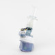 Attachment mounted on an e-rig to demonstrate fit and stance, penguin cap on atomizer; glass art display for head-shop wholesale.