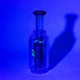 UV-lit shot of Renew the Redwood piece glowing under blacklight; forest accents illuminated for head-shop wholesale listings.
