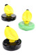 Yellow glass banana carb caps on round bases (black and green), studio group on white; wholesale dab accessory, three-quarter view.