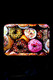 Wholesale small 7" × 5" metal rolling tray covered in colorful sprinkled-donut artwork, flat front angle displaying entire surface.