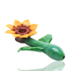 Low-angle sunflower sherlock pipe showing green mouthpiece, side leaves, and yellow petals