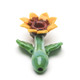 Front view of sunflower sherlock pipe with green mouthpiece, raised leaves, and flower bowl