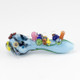 Small blue glass spoon pipe with Great Barrier Reef artwork and compact hand-pipe shape